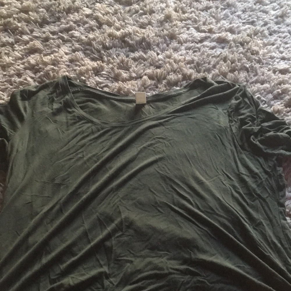 This olive green short sleeve tee shirt is big on me so I’m selling it